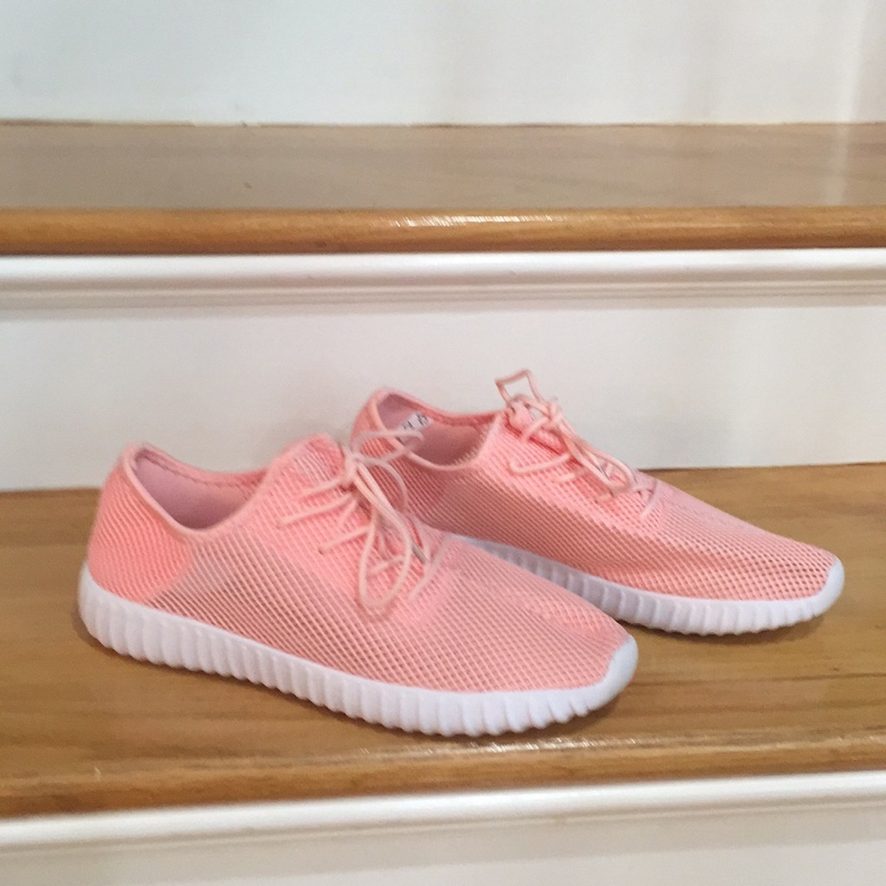 Brand new ,never worn sneakers . Light pink/peach
